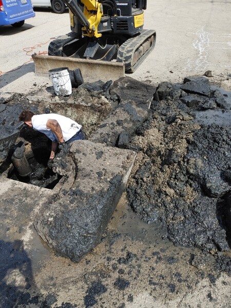 Rebuilding a collapsed man hole in a parking lot in Des Plaines, IL (1)